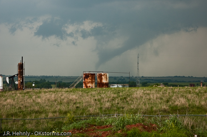 Simultaneous tornadoes continue on the ground for several minutes near Orlando, OK.