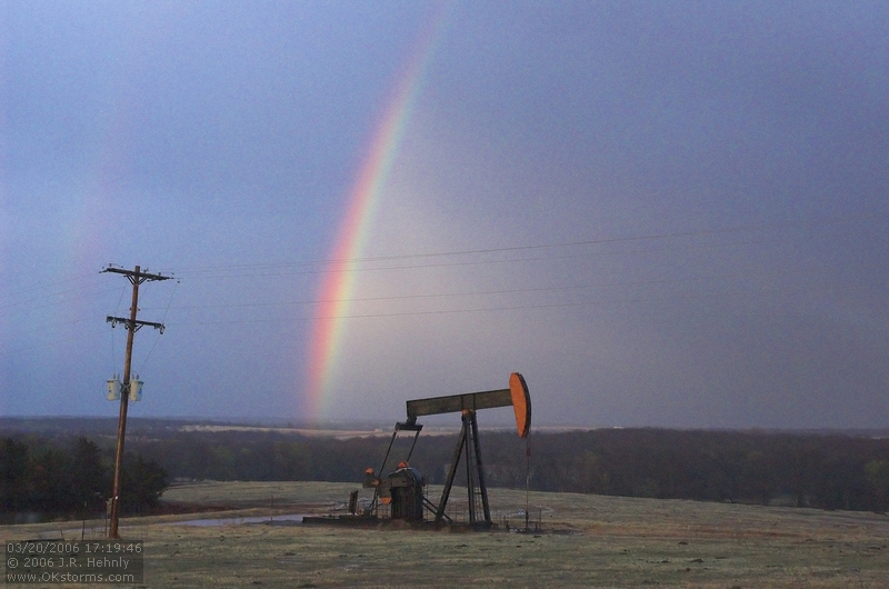 17:19:46 - Rainbow behind an oil pump.