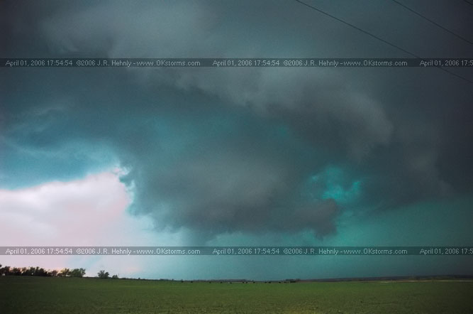 April 1, 2006 - Shamrock, Texas and Western Oklahoma 10 miles east-southeast of Sayre, OK - A forward-flank meso wraps up on the storm.
 - 20060401_175454.jpg