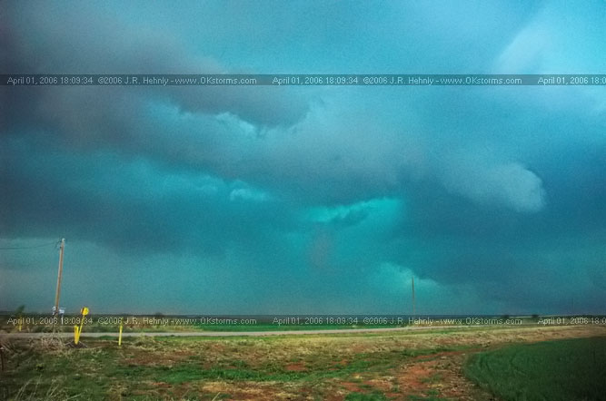 April 1, 2006 - Shamrock, Texas and Western Oklahoma 10 miles east-southeast of Sayre, OK - A forward-flank meso wraps up on the storm.
 - 20060401_180934.jpg
