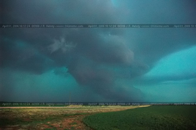 April 1, 2006 - Shamrock, Texas and Western Oklahoma 10 miles east-southeast of Sayre, OK - A forward-flank meso wraps up on the storm.
 - 20060401_181224.jpg