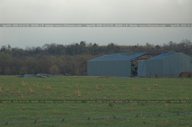 April 6, 2006 - Northeast Oklahoma and Southeast Kansas 12 miles west of Parsons, KS - Apparent tornado damage to a barn.
 - 20060406_192252.jpg