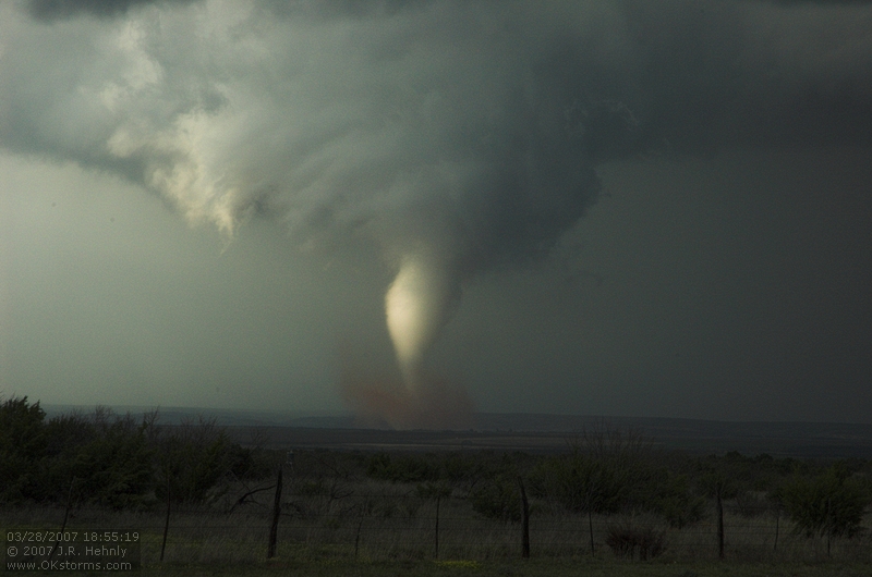 The southern storm produces a very nice tornado as it crosses over the Caprock Canyon State Park. One of the best scenes was when the side was illuminated by the sun the tornado crossed the Red River and threw up a spray of red water.