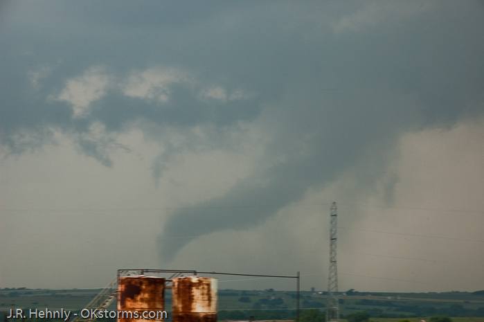 Simultaneous tornadoes continue on the ground for several minutes near Orlando, OK.