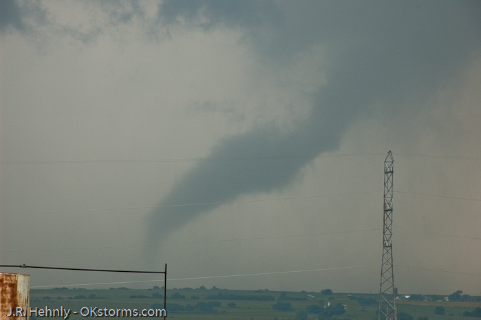 Simultaneous tornadoes continue on the ground for several minutes near Orlando, OK.