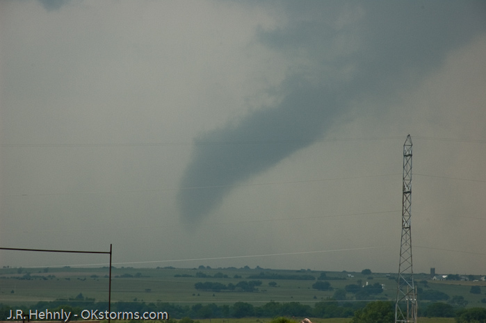 Simultaneous tornadoes continue on the ground for several minutes near Orlando, OK.