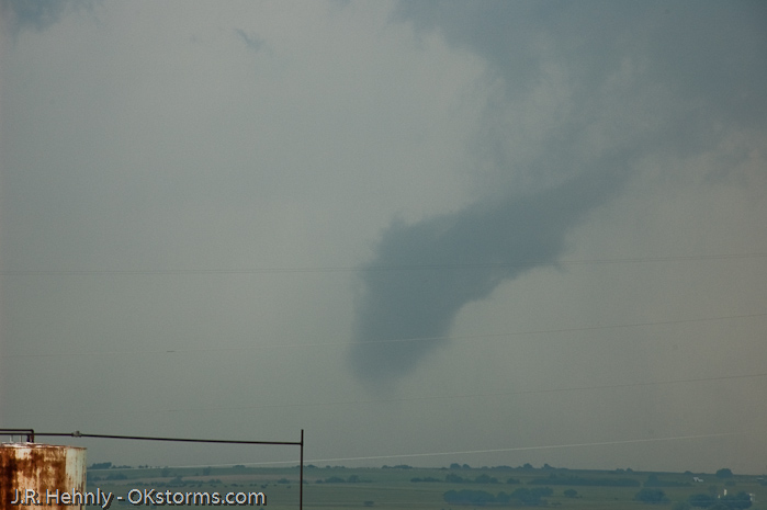 Simultaneous tornadoes continue on the ground for several minutes near Orlando, OK.
