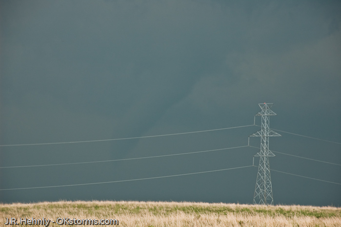 Simultaneous tornadoes continue on the ground for several minutes near Orlando, OK.