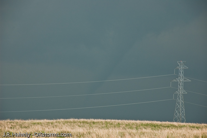 Simultaneous tornadoes continue on the ground for several minutes near Orlando, OK.