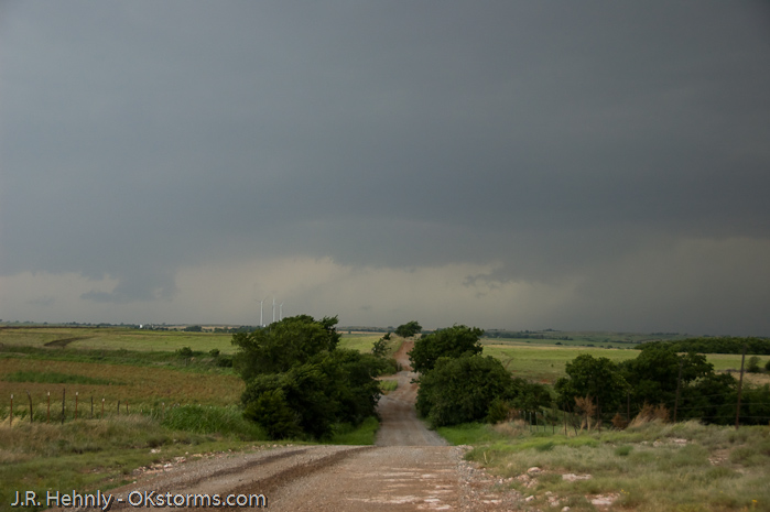 Looking west at numerous lowerings and scud clouds