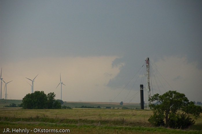 Looking west at numerous lowerings and scud clouds