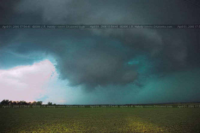 April 1, 2006 - Shamrock, Texas and Western Oklahoma 10 miles east-southeast of Sayre, OK - A forward-flank meso wraps up on the storm.
 - 20060401_175441.jpg