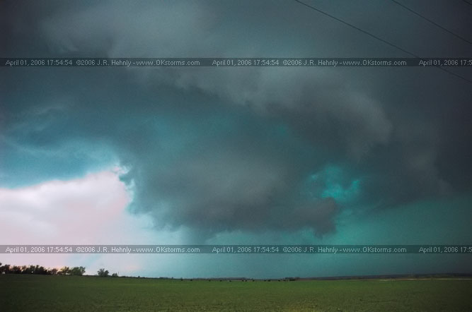 April 1, 2006 - Shamrock, Texas and Western Oklahoma 10 miles east-southeast of Sayre, OK - A forward-flank meso wraps up on the storm.
 - 20060401_175454.jpg