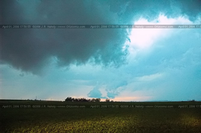 April 1, 2006 - Shamrock, Texas and Western Oklahoma 10 miles east-southeast of Sayre, OK - A forward-flank meso wraps up on the storm.
 - 20060401_175855.jpg