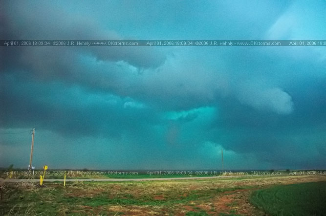 April 1, 2006 - Shamrock, Texas and Western Oklahoma 10 miles east-southeast of Sayre, OK - A forward-flank meso wraps up on the storm.
 - 20060401_180934.jpg