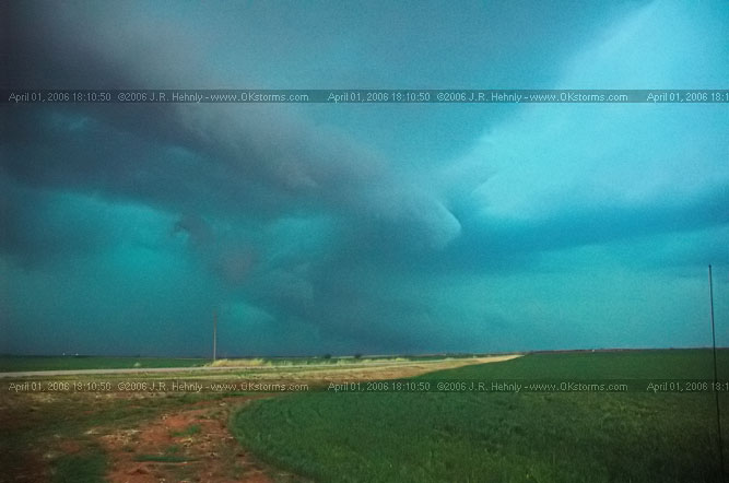 April 1, 2006 - Shamrock, Texas and Western Oklahoma 10 miles east-southeast of Sayre, OK - A forward-flank meso wraps up on the storm.
 - 20060401_181050.jpg
