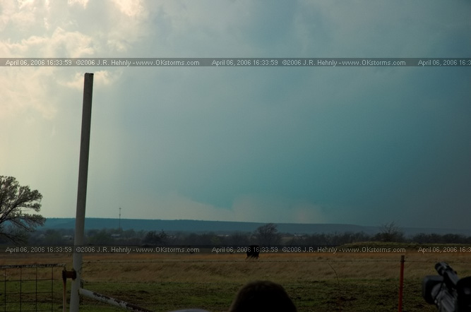 April 6, 2006 - Northeast Oklahoma and Southeast Kansas Southeast of Copan, OK - Tornado warned storm to our west, only a wall cloud is seen.
 - 20060406_163359.jpg