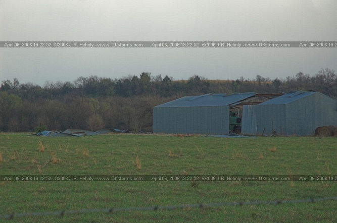 April 6, 2006 - Northeast Oklahoma and Southeast Kansas 12 miles west of Parsons, KS - Apparent tornado damage to a barn.
 - 20060406_192252.jpg