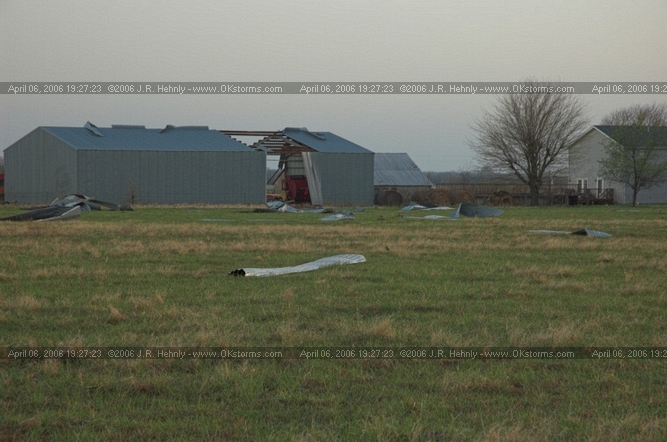 April 6, 2006 - Northeast Oklahoma and Southeast Kansas 12 miles west of Parsons, KS - Apparent tornado damage to a barn.
 - 20060406_192723.jpg