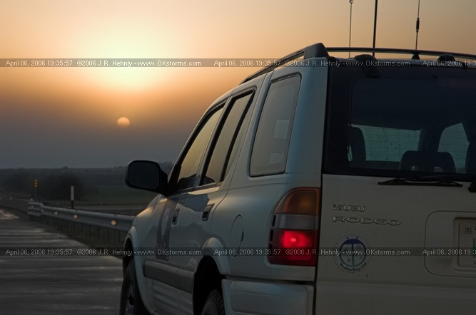 April 6, 2006 - Northeast Oklahoma and Southeast Kansas 12 miles west of Parsons, KS - Sun sets into a haze of blowing dust .
 - 20060406_193557.jpg