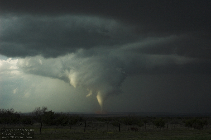 The southern storm produces a very nice tornado as it crosses over the Caprock Canyon State Park. One of the best scenes was when the side was illuminated by the sun the tornado crossed the Red River and threw up a spray of red water.