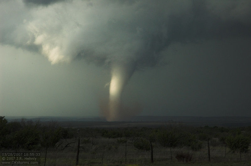 The southern storm produces a very nice tornado as it crosses over the Caprock Canyon State Park. One of the best scenes was when the side was illuminated by the sun the tornado crossed the Red River and threw up a spray of red water.