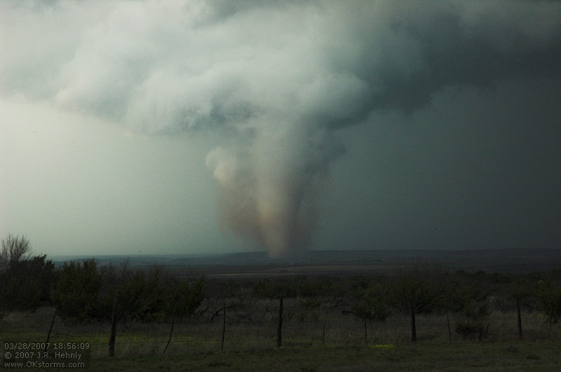 The southern storm produces a very nice tornado as it crosses over the Caprock Canyon State Park. One of the best scenes was when the side was illuminated by the sun the tornado crossed the Red River and threw up a spray of red water.