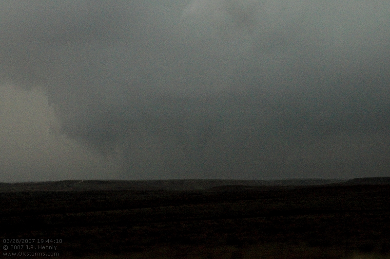 This hard to see tornado, wrapped in rain, is what we believe was responsible for the overturned cars and semis along I-40 east of Groom. The tornado here is very near to I-40.